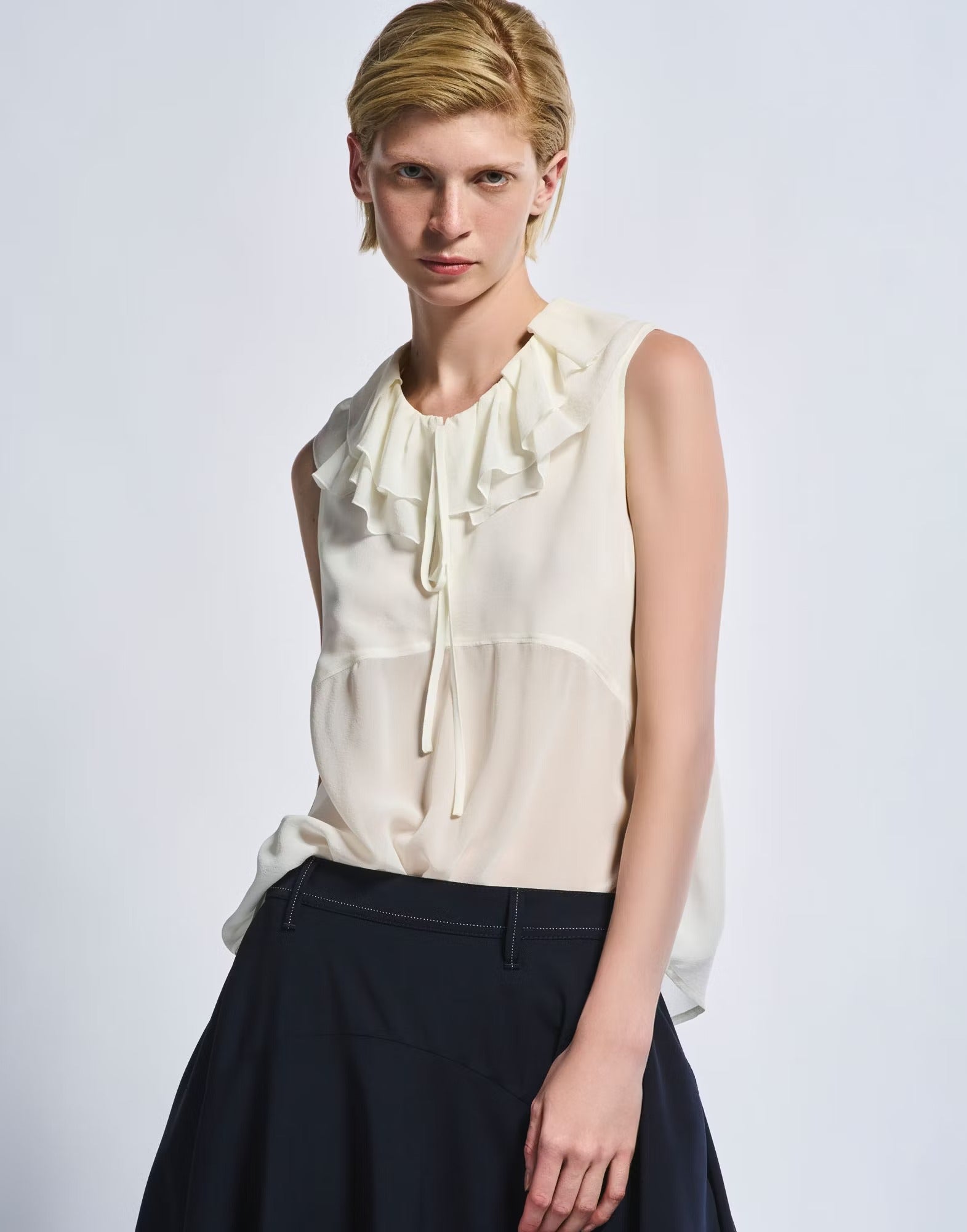 Peep silk georgette top with ruffled collar
