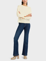 Knit sweater with contrast sleeve slit