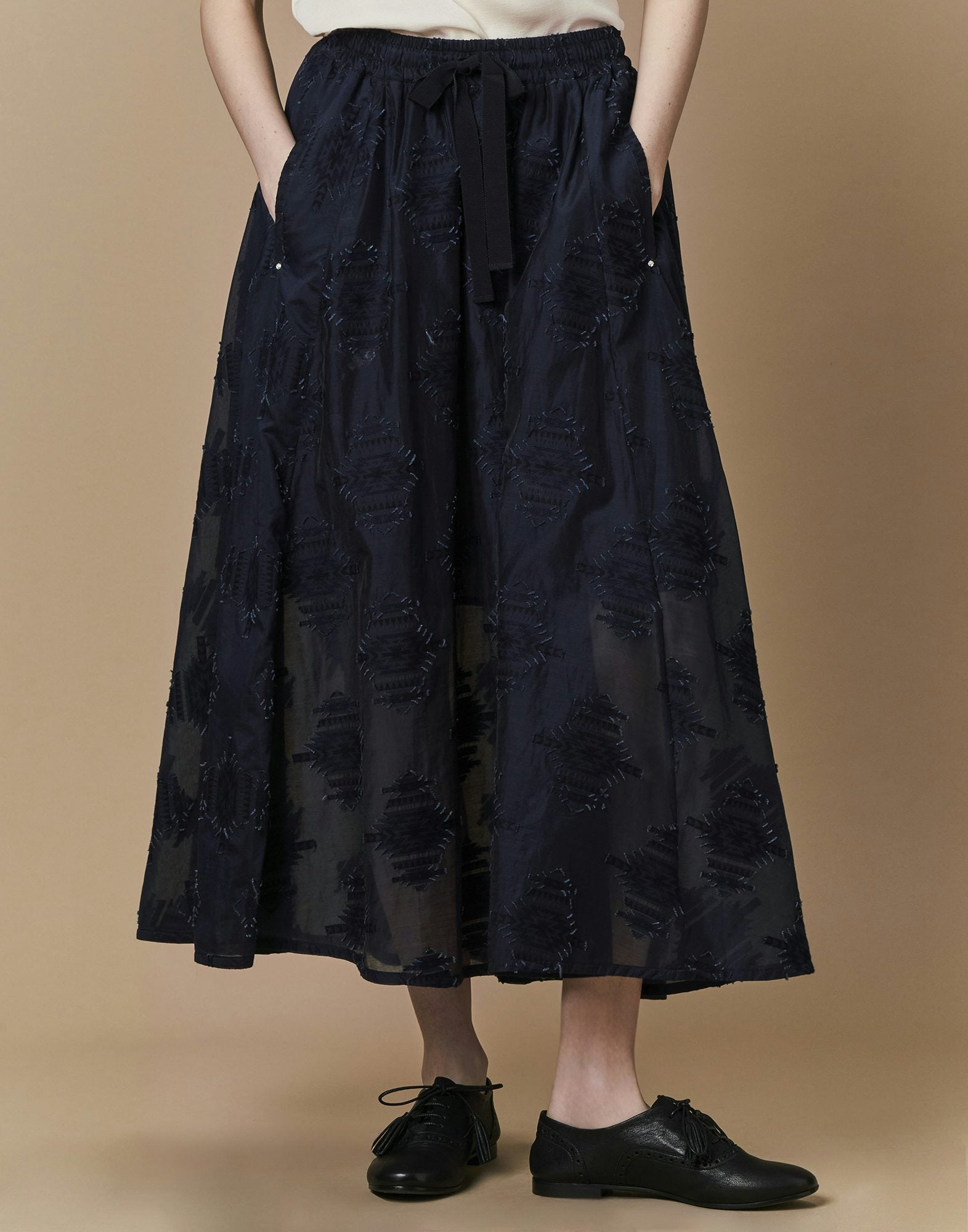 Enhance full longer length skirt in navy fil-coupe