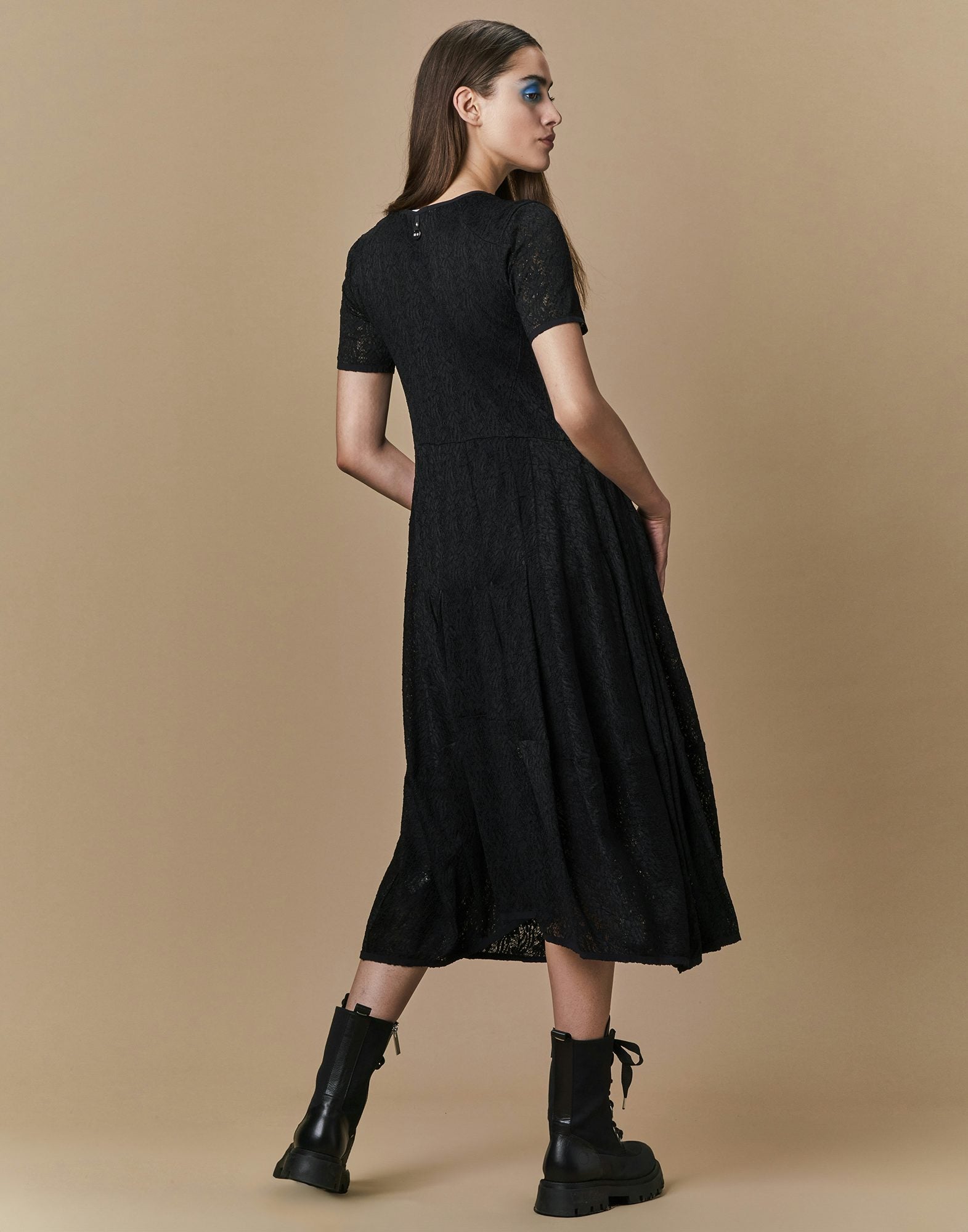 Mesmerize Fit and flare dress in black tech lace