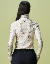 Logical turtleneck top in lace jersey with gold floral over-print