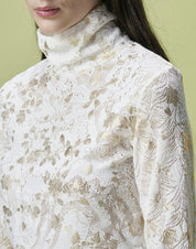 Logical turtleneck top in lace jersey with gold floral over-print