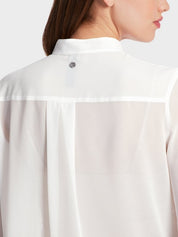 Blouse with flounces