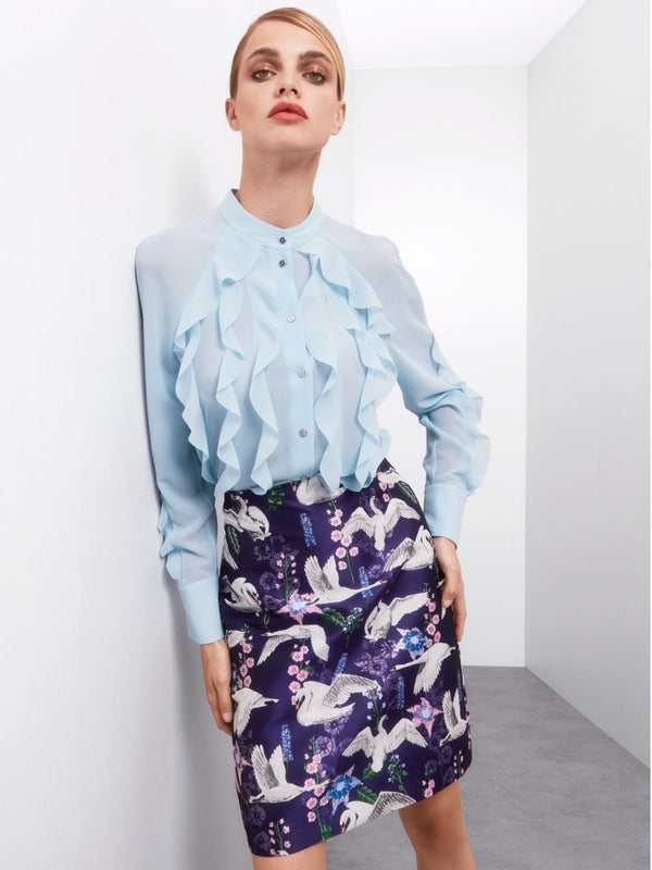 Blouse with flounces