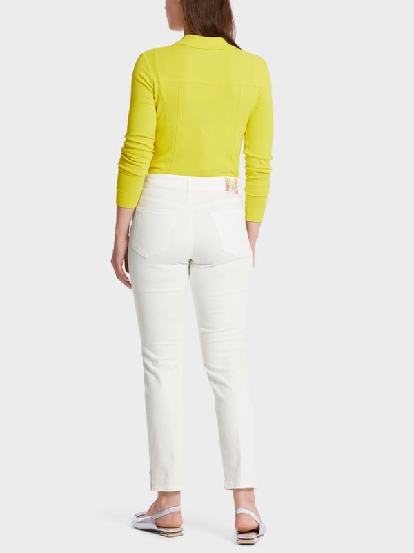 White Denim pants 7/8 length buttoned at hem zip fly