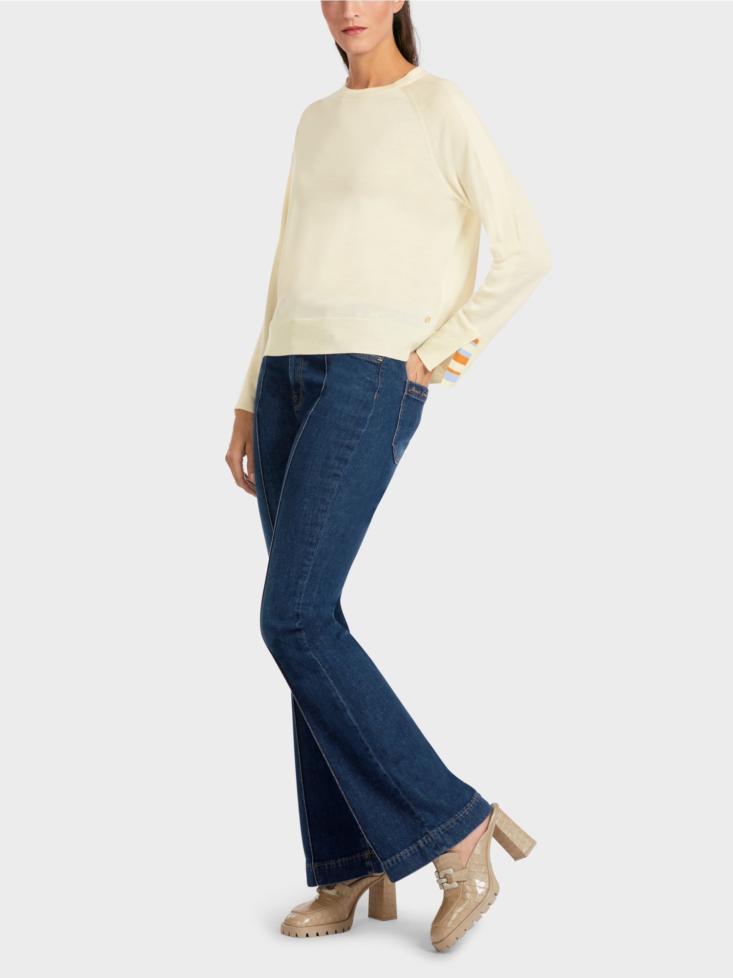 Knit sweater with contrast sleeve slit